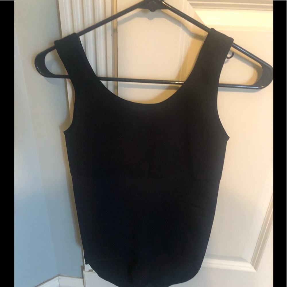 A SPANX size LARGE bodysuit. New!